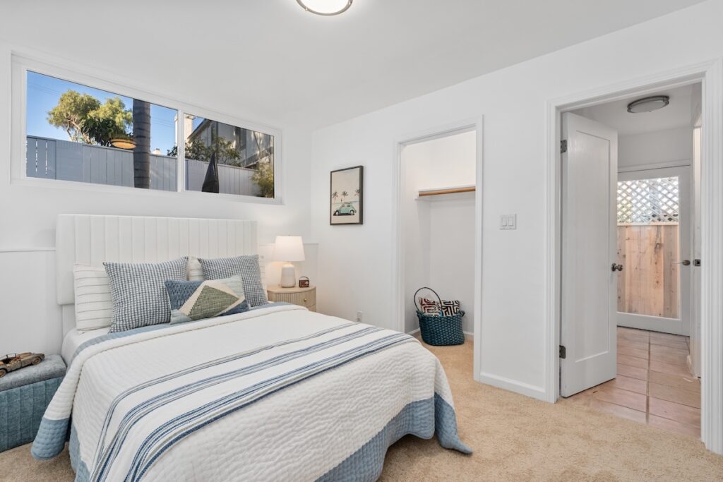 Hermosa Beach bedroom staging by DomaStyle Design, a RESA® member, designed to support a home sale over list price