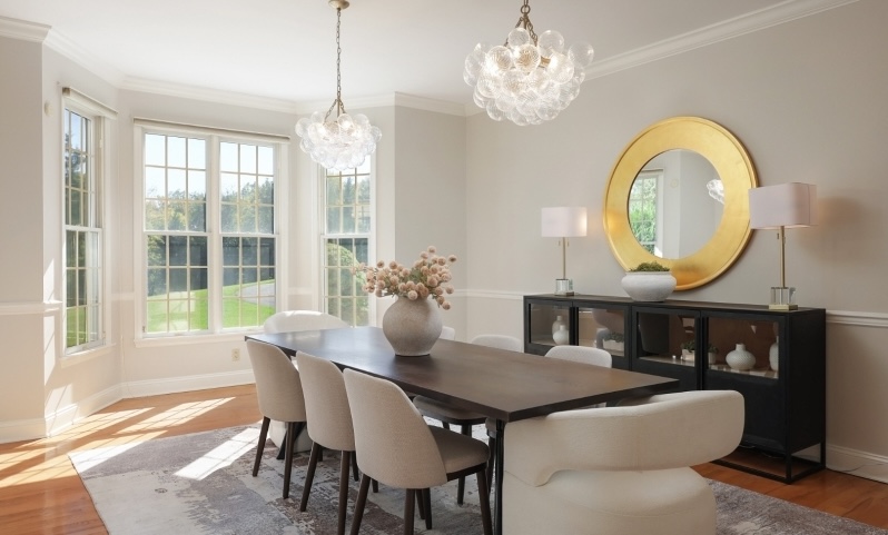 Professionally staged dining room by CHCin Scotch Plains Township, New Jersey featuring modern lighting, neutral furnishings, and upscale styling designed to enhance buyer appeal and elevate the home's presentation online and in person.