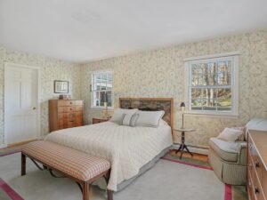 Liz Pensiero gives home owners tips how to prepare their home for sale, even while living it. This is a bedroom after her expert advice and staging was implemented.