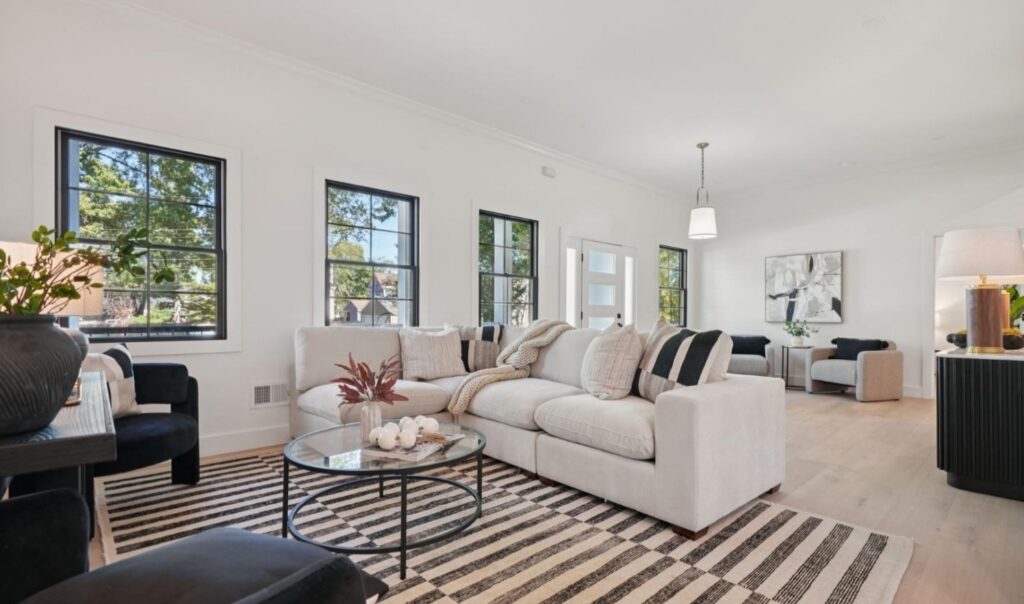 Professionally staged modern living room by RESA stager CHC in New Providence Boro, New Jersey featuring contemporary furniture, open layout styling, and neutral design elements that enhanced buyer appeal and online listing presentation.